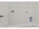 Laundry room with tile flooring, hookups, and white walls at 347 Wappoo Trace Ln, Summerville, SC 29486