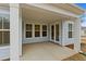 Covered patio with white columns, and a ceiling fan for outdoor comfort at 347 Wappoo Trace Ln, Summerville, SC 29486