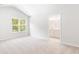 Spacious main bedroom with lots of natural light and connected bathroom at 348 Dickerson Ln, Lincolnville, SC 29485