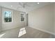 Comfortable bedroom with two windows allowing for ample natural light and plush carpeting at 4155 Jean Laffite Rd, Hollywood, SC 29449
