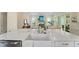 Farmhouse sink with a view offers a stylish and functional space in the kitchen at 4155 Jean Laffite Rd, Hollywood, SC 29449