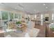 Bright, open-concept living room and kitchen with modern appliances and comfortable seating at 4155 Jean Laffite Rd, Hollywood, SC 29449