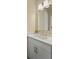 Bright powder room showcasing a modern vanity with a white countertop and gold faucet at 4155 Jean Laffite Rd, Hollywood, SC 29449
