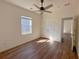Light-filled bedroom featuring ceiling fan and hardwood floors at 434 Pender Woods Dr, Summerville, SC 29486