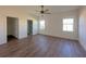 A light filled bedroom with neutral walls has a walk-in closet and bathroom entry at 434 Pender Woods Dr, Summerville, SC 29486