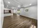 Spacious living room features hardwood floors, recessed lighting, and a large window with backyard views at 4412 Abby Dr, North Charleston, SC 29418