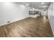 Spacious open floor plan featuring hardwood floors and stairs at 4412 Abby Dr, North Charleston, SC 29418