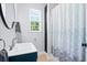 Bathroom featuring a single sink vanity and a shower with a curtain at 4429 Highway 162, Hollywood, SC 29449