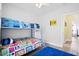 Bedroom featuring a bunk bed, closet, and a door leading to another room at 4429 Highway 162, Hollywood, SC 29449