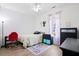 Bedroom features a bed, a desk, and a window with curtains at 4429 Highway 162, Hollywood, SC 29449