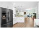 Open concept kitchen featuring stainless steel appliances, a breakfast bar, and plenty of cabinet space at 4429 Highway 162, Hollywood, SC 29449