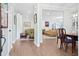 Open-concept living space with hardwood floors, neutral walls, and ample natural light for a seamless flow at 4429 Highway 162, Hollywood, SC 29449