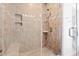 Bathroom with a tile shower featuring a built-in bench and shampoo niche at 4429 Highway 162, Hollywood, SC 29449