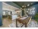 Open-concept dining area seamlessly connects to the kitchen, great for entertaining guests at 5009 W Liberty Park Cir, North Charleston, SC 29405