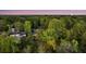 Aerial view of the property surrounded by lush greenery and trees at 506 Fairington Dr, Summerville, SC 29485