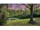 Inviting backyard with a fire pit and chairs for entertaining guests at 506 Fairington Dr, Summerville, SC 29485