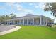 Spacious community clubhouse with a covered porch and well-manicured lawn at 506 Fairington Dr, Summerville, SC 29485