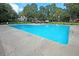 Expansive community pool with a gazebo and plenty of lounge chairs for residents at 506 Fairington Dr, Summerville, SC 29485