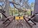 Wooden deck offers a secluded spot with picturesque views, ideal for relaxing and enjoying nature at 506 Fairington Dr, Summerville, SC 29485