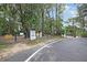Gated entrance to playground and picnic area with visible signage and a paved road at 506 Fairington Dr, Summerville, SC 29485