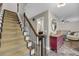 Spacious entryway featuring a staircase, stone floor, and decorative accents at 506 Fairington Dr, Summerville, SC 29485