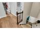 Upper hallway with a staircase and wrought iron handrail at 506 Fairington Dr, Summerville, SC 29485