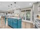 Spacious kitchen features a large island with seating, stainless steel appliances and ample counter space at 506 Fairington Dr, Summerville, SC 29485