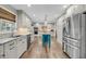 Spacious kitchen featuring stainless steel appliances, a large island, and ample counter space for food preparation at 506 Fairington Dr, Summerville, SC 29485