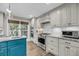 Well-appointed kitchen showcasing stainless steel appliances, granite countertops, and white cabinetry at 506 Fairington Dr, Summerville, SC 29485