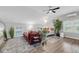 Bright living room featuring wood floors, neutral walls, modern furniture and natural light at 506 Fairington Dr, Summerville, SC 29485