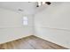 Bright bedroom with neutral walls and wood-look flooring at 509 Hill St, Moncks Corner, SC 29461