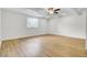 A bonus room with hard surface floors, neutral paint, a ceiling fan and a window at 509 Hill St, Moncks Corner, SC 29461