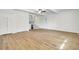 Spacious living room with sleek wood floors, fresh paint, and a serving area at 509 Hill St, Moncks Corner, SC 29461