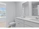 Bathroom featuring double sinks with a shower visible in the mirror at 5520 Bowmore Blvd, Ravenel, SC 29470