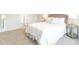 Serene bedroom showcasing a comfortable bed, side tables, and neutral color palette at 5520 Bowmore Blvd, Ravenel, SC 29470