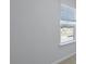 Bright bedroom featuring neutral carpet and a view of the neighborhood at 5520 Bowmore Blvd, Ravenel, SC 29470