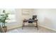 Functional home office with a modern desk, comfortable chair, and natural light at 5520 Bowmore Blvd, Ravenel, SC 29470