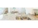 Bright kitchen features a granite countertop, stainless steel sink, and modern faucet at 5520 Bowmore Blvd, Ravenel, SC 29470