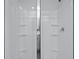 Clean glass shower with a chrome shower head and built in shelves at 5520 Bowmore Blvd, Ravenel, SC 29470