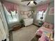 Sweet bedroom featuring pastel accents, a comfortable bed, and plenty of natural light at 640 Semaht St, Charleston, SC 29412