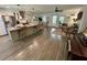 Open-concept kitchen features a large island, stainless steel appliances, and a seamless flow into the living area at 640 Semaht St, Charleston, SC 29412
