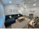 Bright living room features a comfortable sofa, modern decor, and ample natural light at 640 Semaht St, Charleston, SC 29412