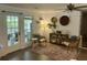 Bright sitting area with french doors, modern decor, and lots of natural light at 640 Semaht St, Charleston, SC 29412
