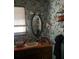 Vintage bathroom with floral wallpaper, classic fixtures, and an orange vanity at 805 Horne St, Saint George, SC 29477