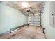 Clean and well-lit single-car garage with an automatic door opener and concrete flooring at 8739 Grassy Oak Trl, North Charleston, SC 29420