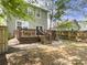 Backyard featuring a wooden deck perfect for outdoor relaxation at 8810 Gilston Ln, North Charleston, SC 29420