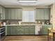 Well-equipped kitchen with stainless steel appliances, sleek cabinets, and stone countertops at 8810 Gilston Ln, North Charleston, SC 29420