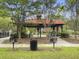 Community pavilion with picnic tables and barbecue grills, ideal for gatherings and outdoor recreation at 8810 Gilston Ln, North Charleston, SC 29420