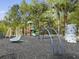 Community playground with multiple play structures and equipment for active children at 8810 Gilston Ln, North Charleston, SC 29420