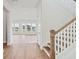 Bright entryway featuring wood floors, staircase and views to the living area at 96 French Garden Cir, Summerville, SC 29486